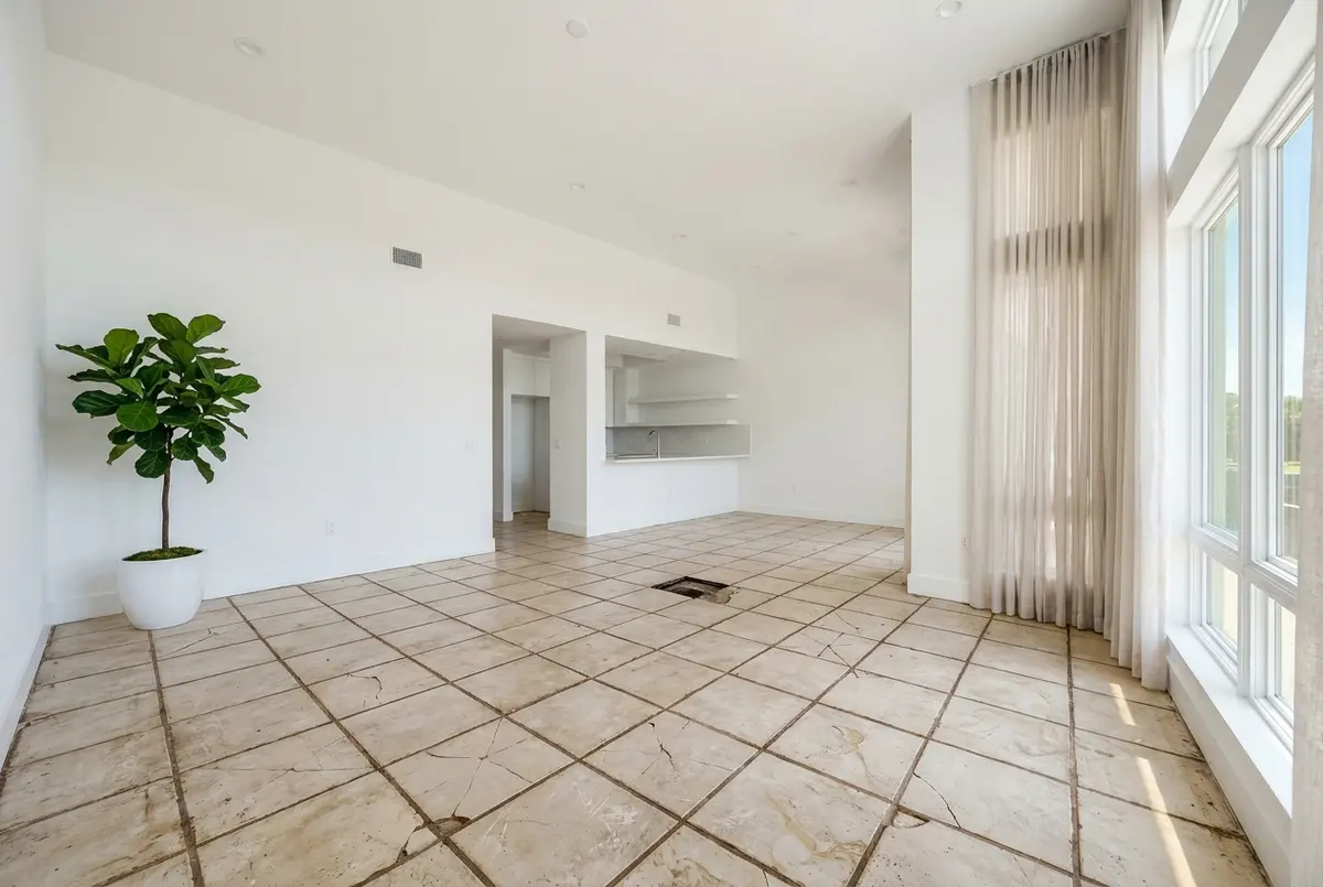 Cracked, broken stone tile floor